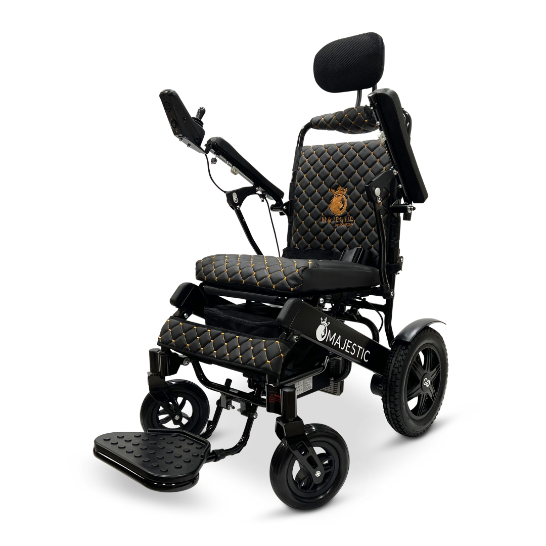 Introducing the ComfyGo MAJESTIC IQ-9000 Auto Recline Remote Controlled Electric Wheelchair, a modern marvel featuring black quilted upholstery and gold accents. It is equipped with brushless silent motors and offers adjustable headrest, armrests, and footrest for maximum comfort. Designed to handle varied terrain with its sturdy wheels, this wheelchair ensures smooth navigation using its digital joystick controller.